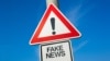 Generic – Fake News - traffic sign with exclamation mark to alert, warn caution - precaution and warning of false information, hoax, disinformation